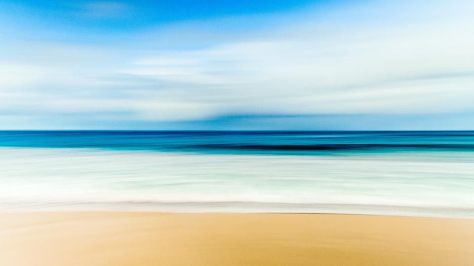 The beach and the water beyond it
